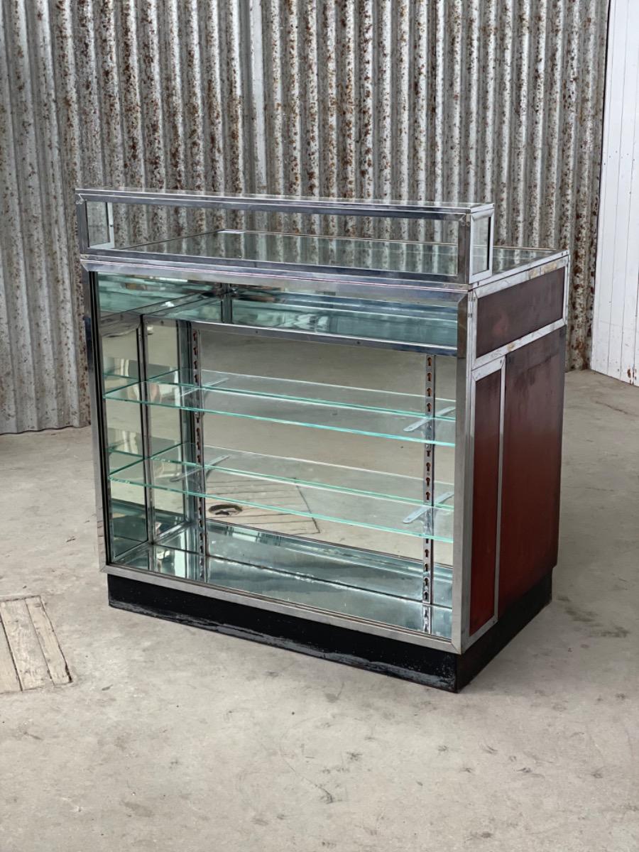 Antique Antique glass counter with drawers
