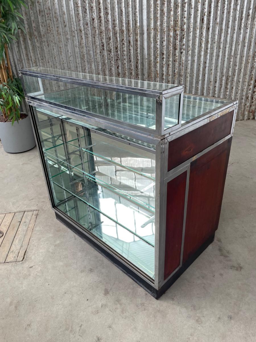 Antique Antique glass counter with drawers