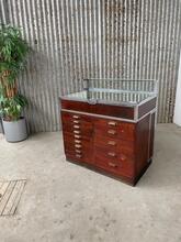 Antique style Antique glass counter with drawers  in Wood and glass, Europe