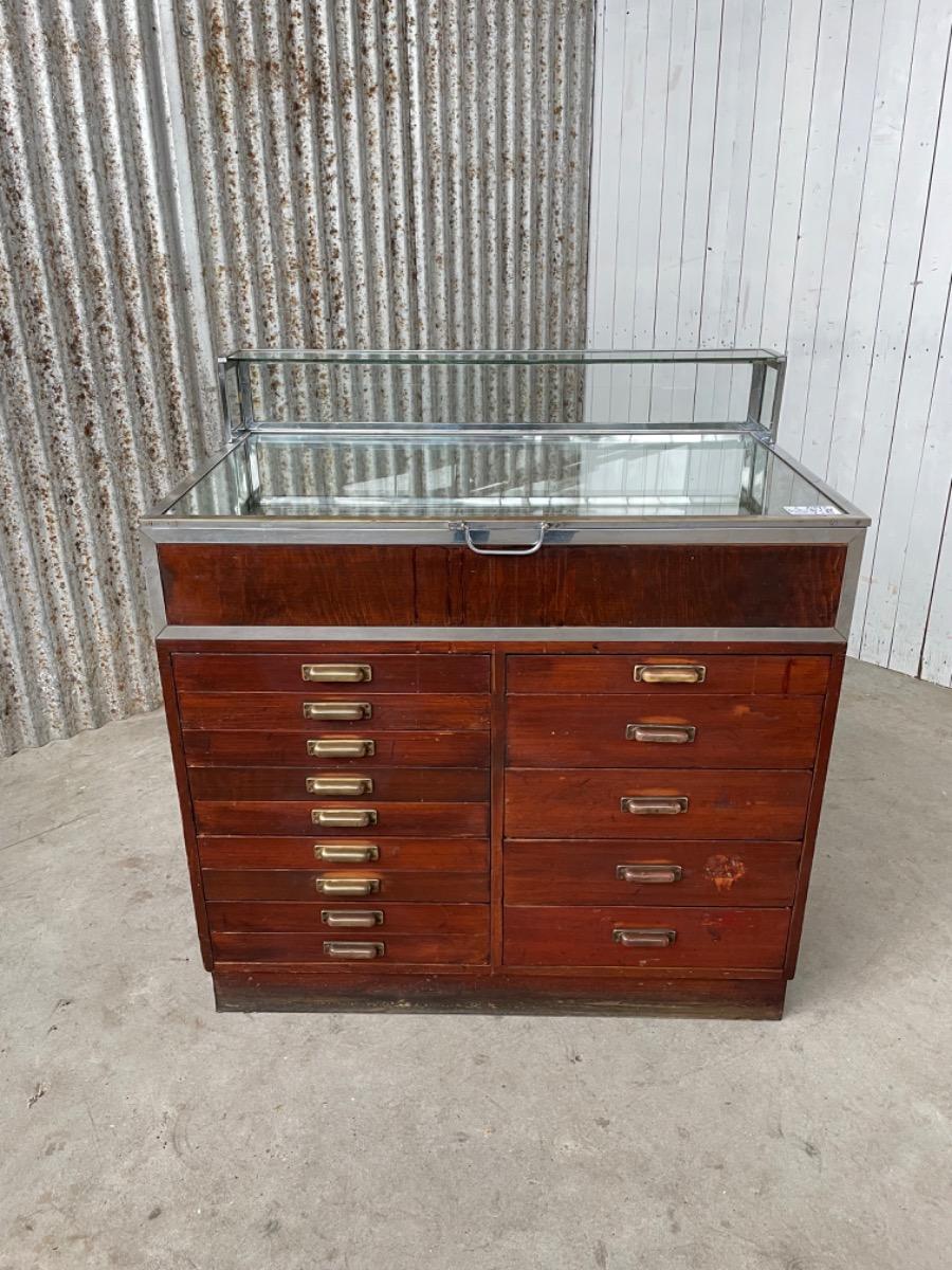 Antique Antique glass counter with drawers