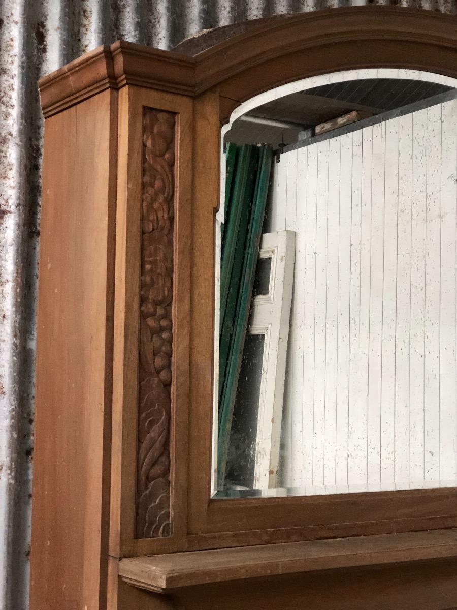 Antique big fireplace with mirror