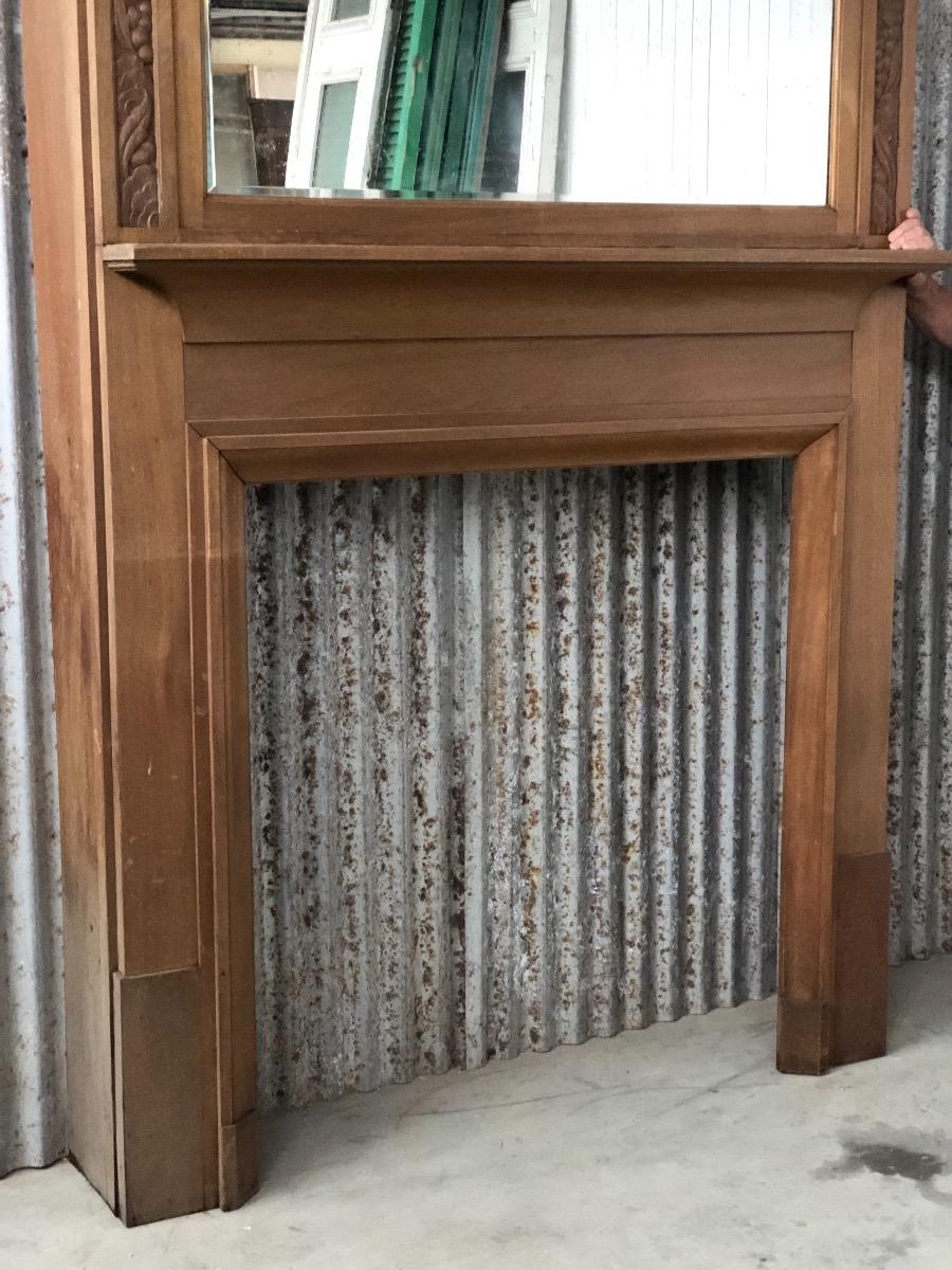 Antique big fireplace with mirror