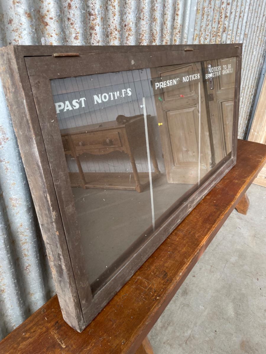 Antique glass vitrine wall cabinet