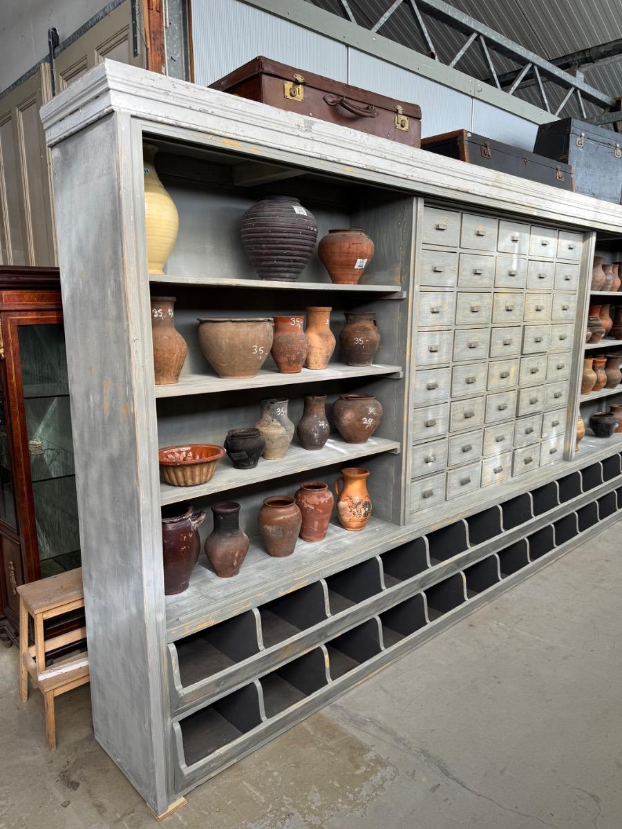 Antique shop cabinet in grey