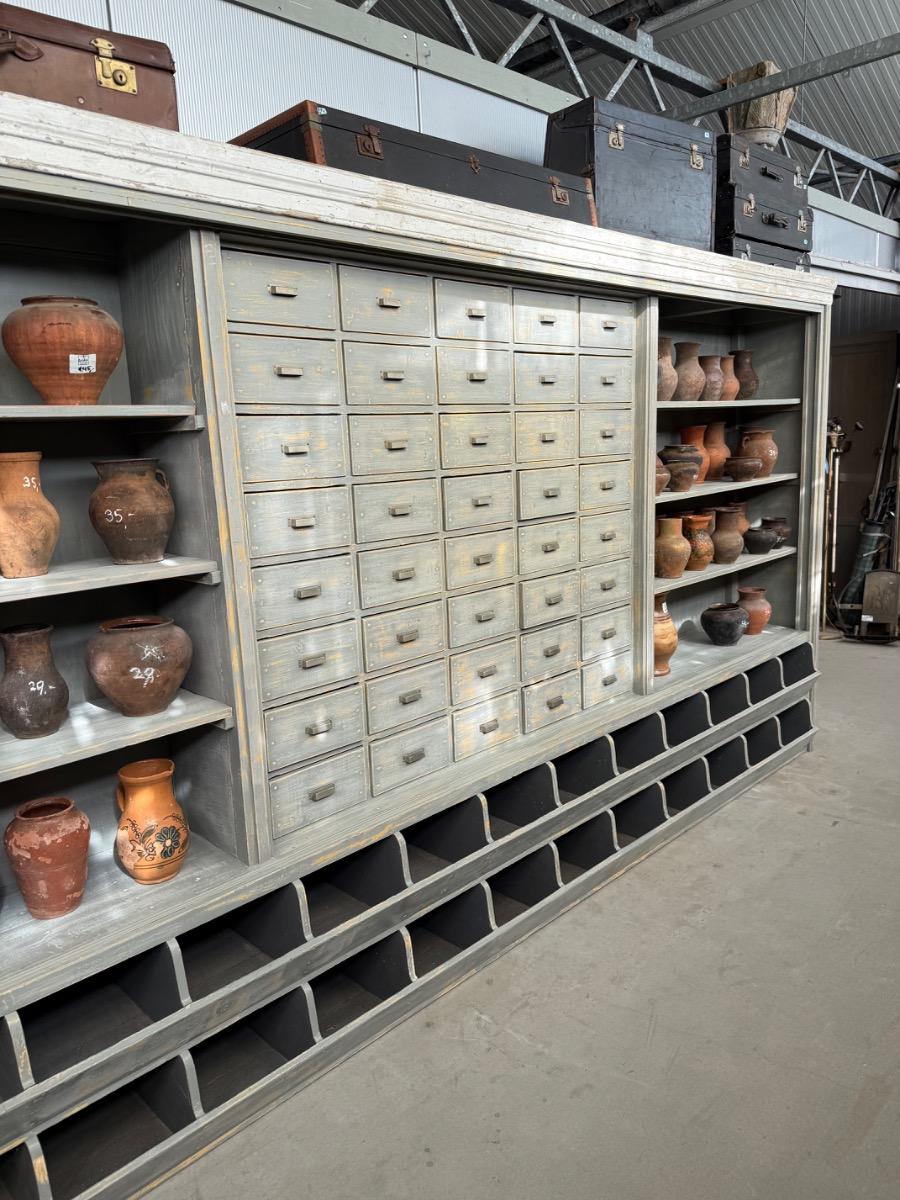 Antique shop cabinet in grey