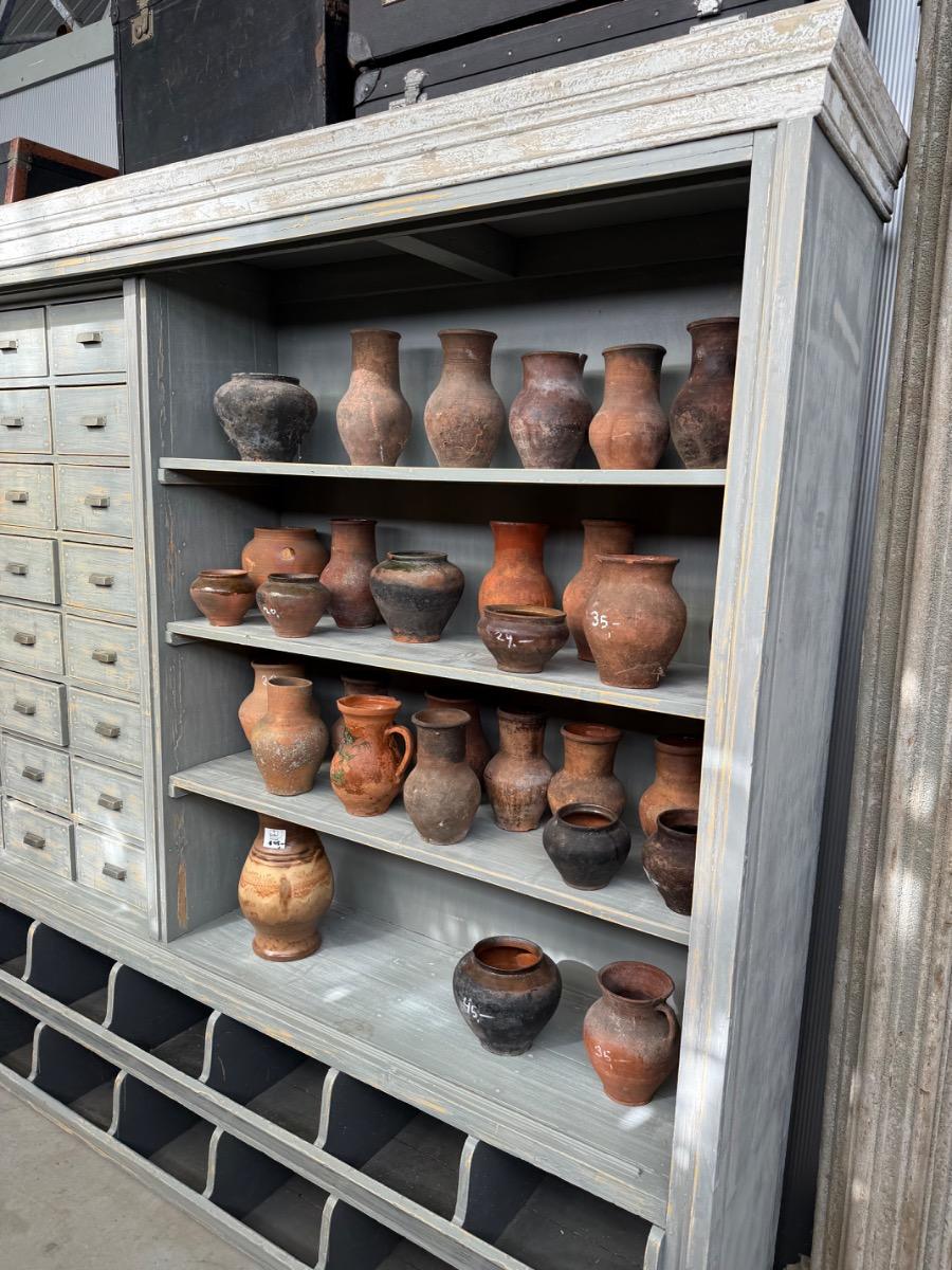 Antique shop cabinet in grey