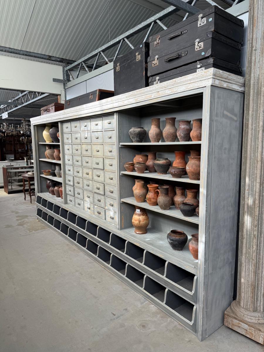 Antique shop cabinet in grey
