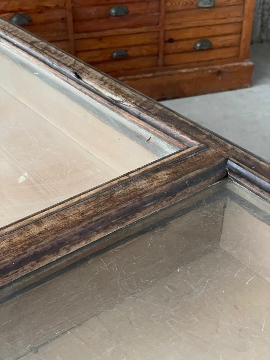 Antique shop counter with drawers and glass