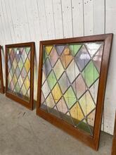 Antique style stained glass window in Wood