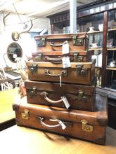Antique style Antique suitcases in leather, England