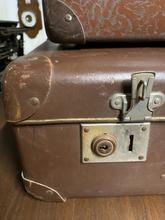 Antique style Antique suitcases in leather
