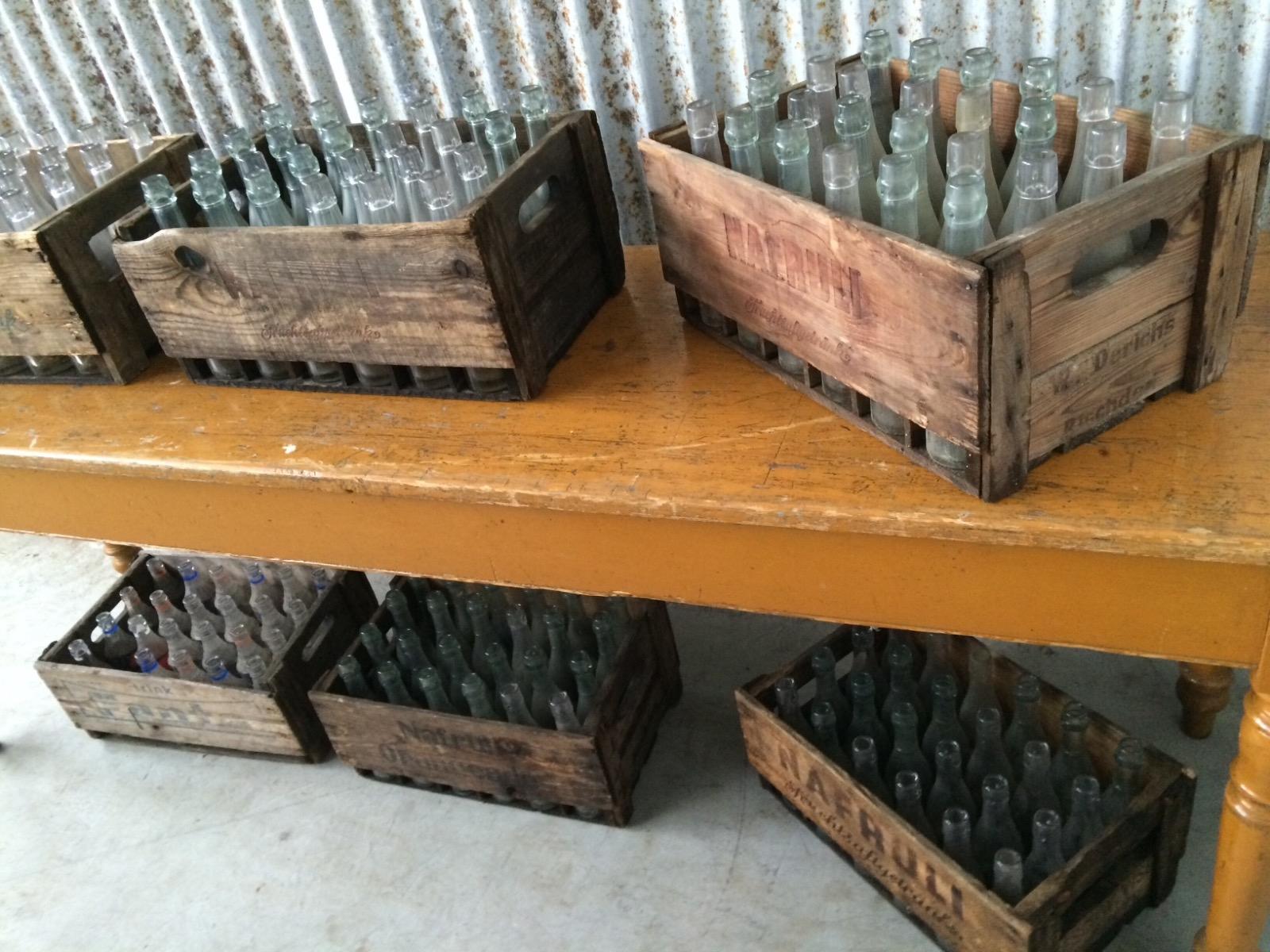 Old wooden box with bottles
