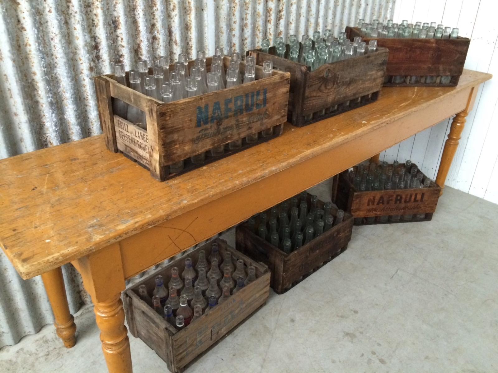 Old wooden box with bottles