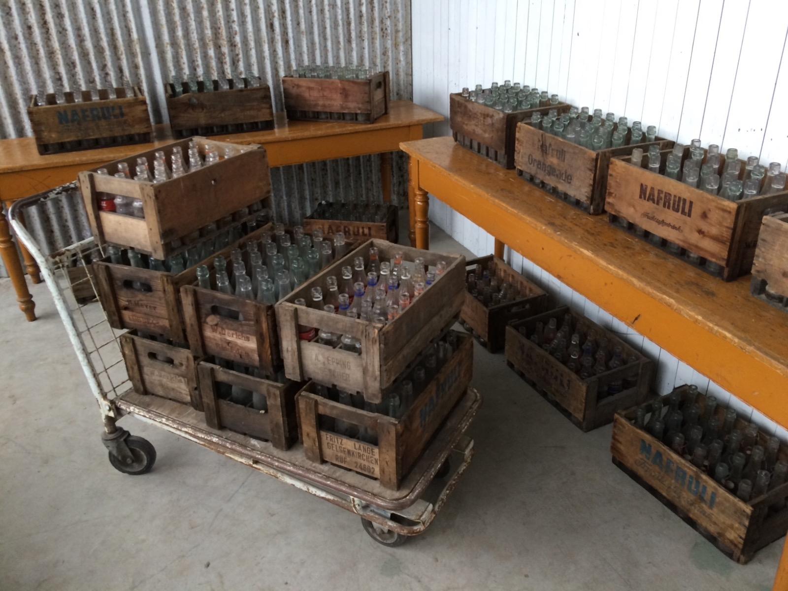 Old wooden box with bottles