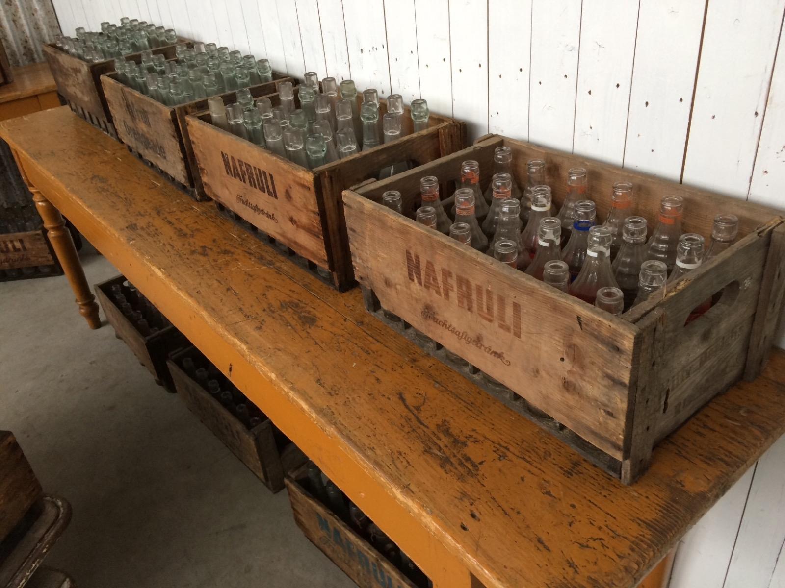 Old wooden box with bottles