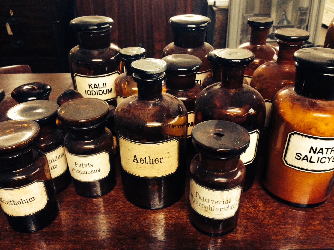 Several vintage old pharmacy bottles