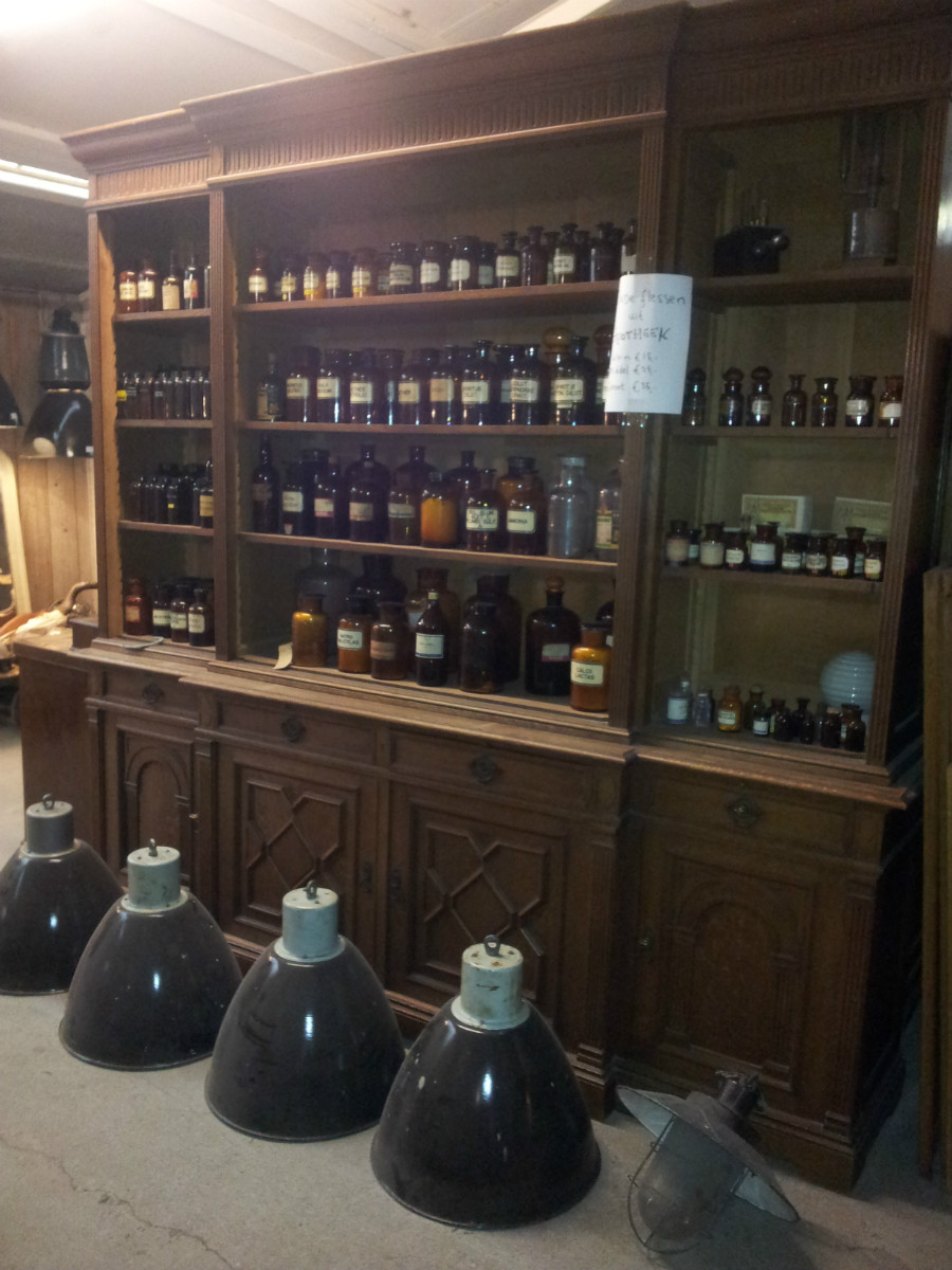 Several vintage old pharmacy bottles