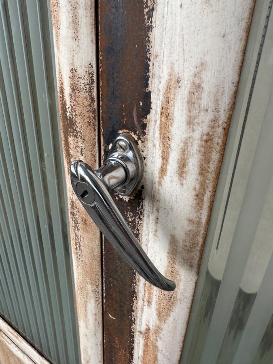 Vintage cabinet iron and glass